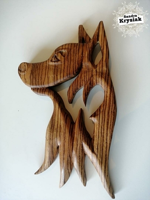 Héctor Escultura calada y tallada en madera de zebrano. 2021
