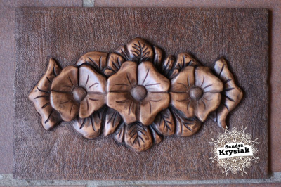 Isidro, talla floral