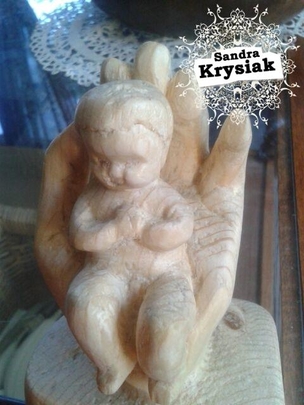 Pilar. Escultura tallada en madera de Pino