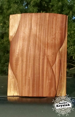 Relieve en madera de Kotibe. Ángel.