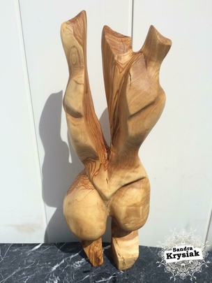 Sergio Misert. Escultura en madera de olivo.