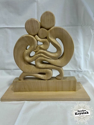Escultura en madera de tilo, (Familia). Juan Aguirrebengoa.