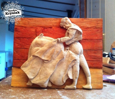 Adelaida. Alto relieve de torero en madera de roble teñida con tinte al agua de caoba y avellano
