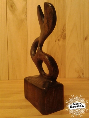 Paco. Escultura tallada en tilo y teñida con betún de judea y cera. 2015